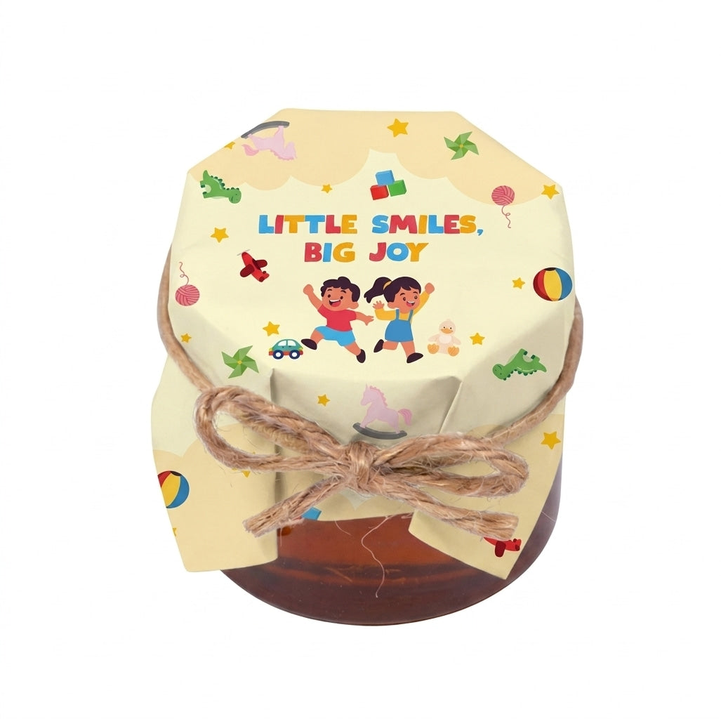Small honey jar gift with Little Smiles, Big Joy packaging, presented in a transparent single clear box.