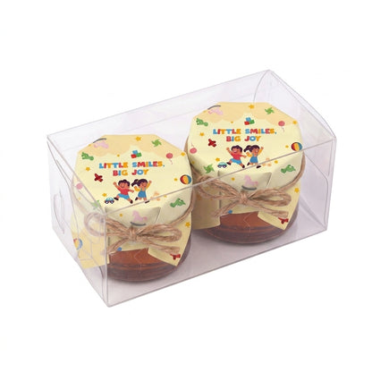 Twin honey jar gift set with Little Smiles, Big Joy packaging, presented in a transparent twin box.
