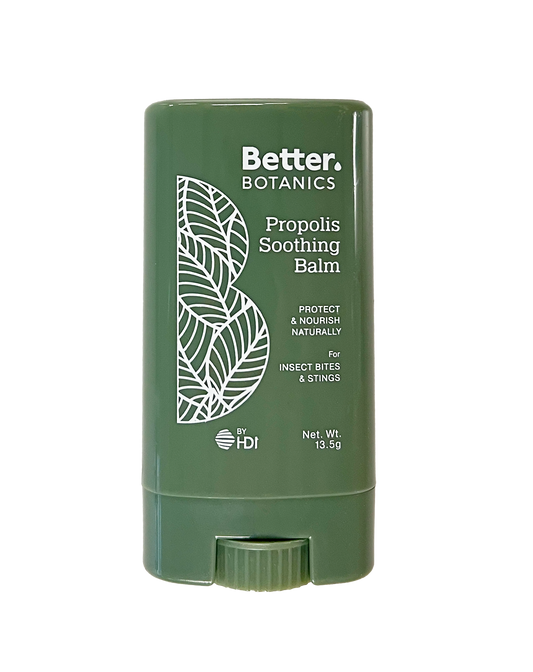 Green stick balm container with 'Better Botanics' branding on a white background