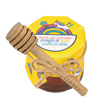 Yellow container with wooden spoon and decorative elements on a white background